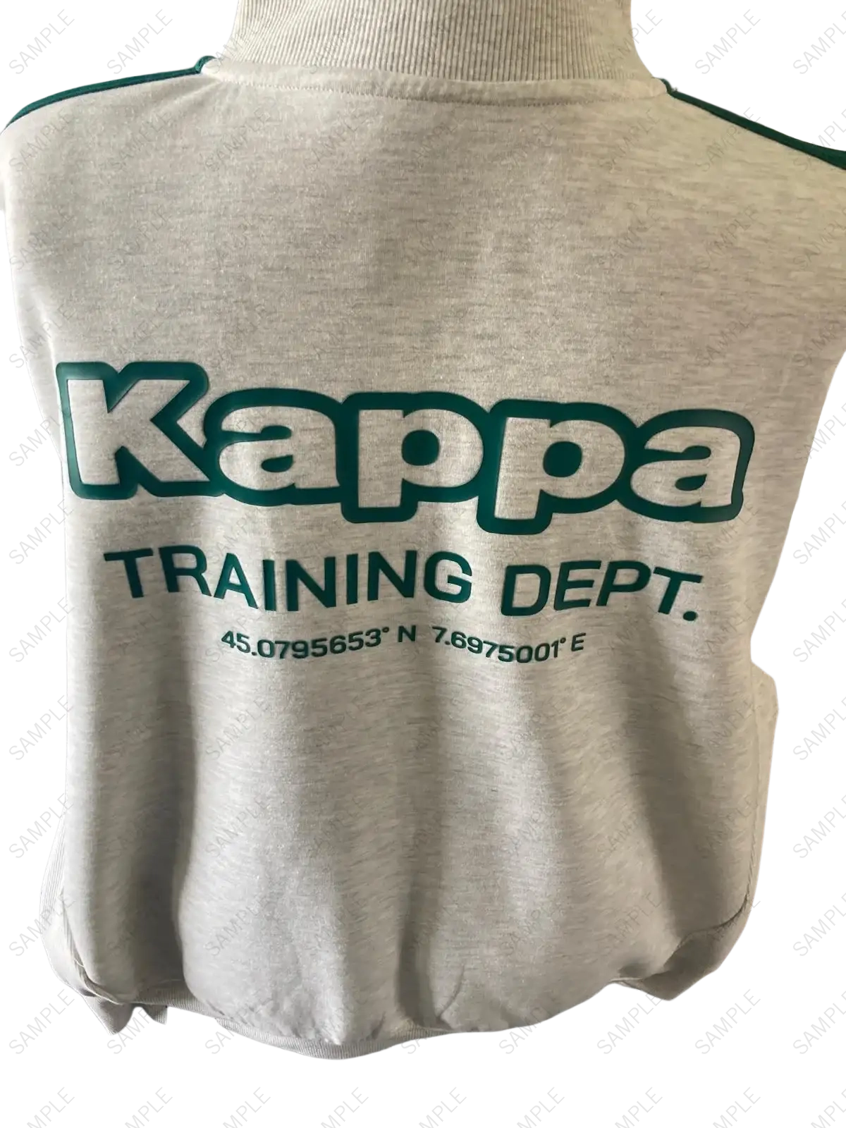 Close-up of sweatshirt fabric and green side stripe