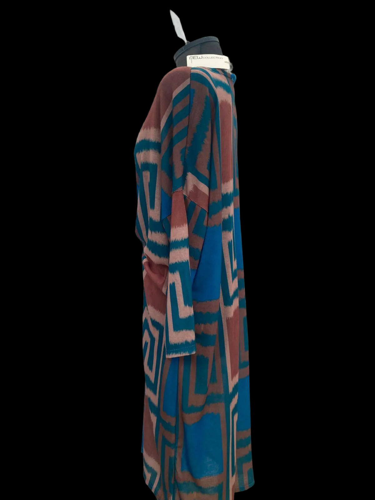 Back view of geometric patterned dress on mannequin