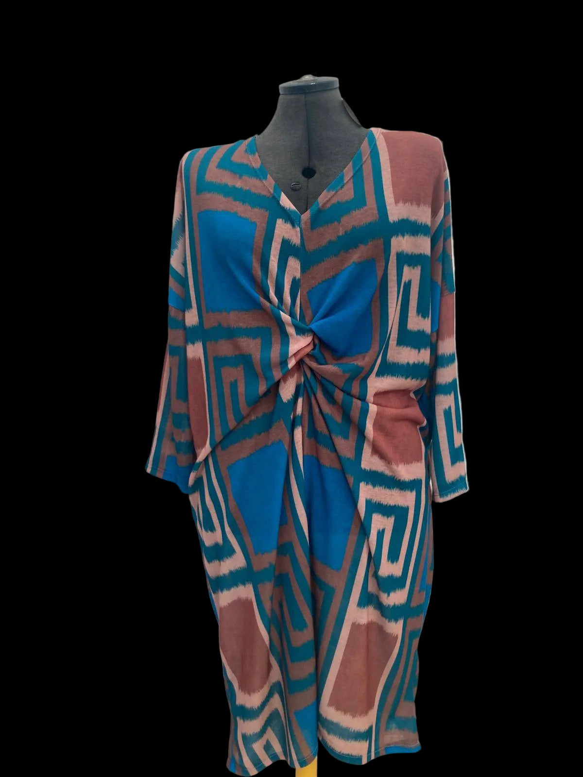 Colorful geometric dress with twisted front detail