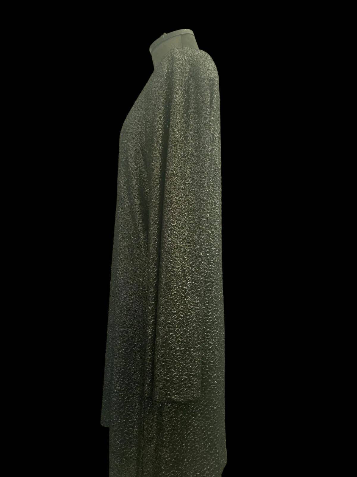 Side view of long sleeve dress with glittery textured fabric for versatile styling