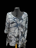 Abstract patterned top with pockets and flared silhouette