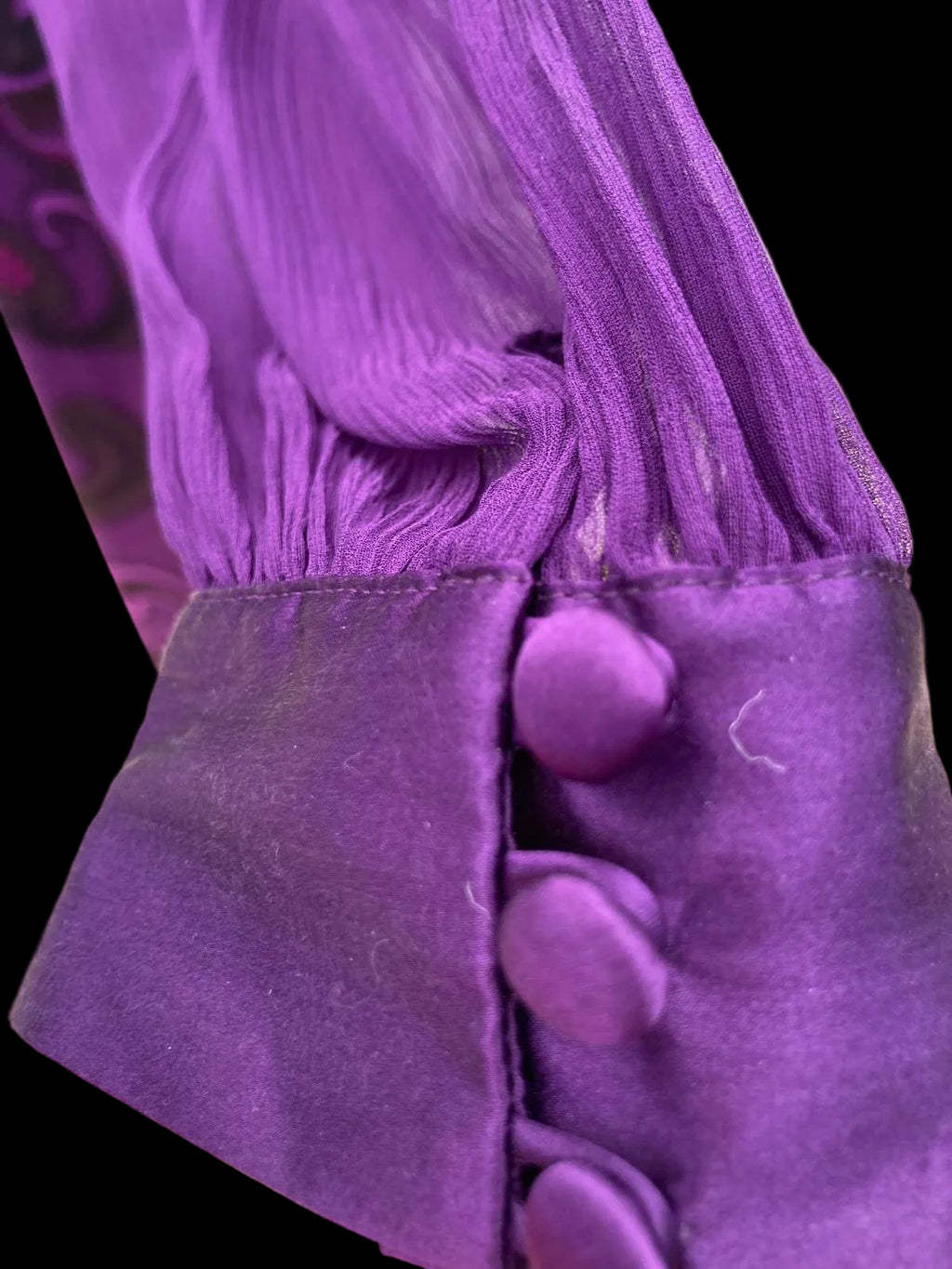 Purple silk dress sleeve with button detail