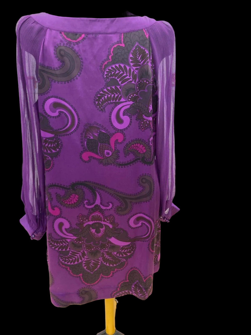 Back view of purple silk dress with embroidered pattern