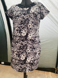 Floral dress with short sleeves on mannequin
