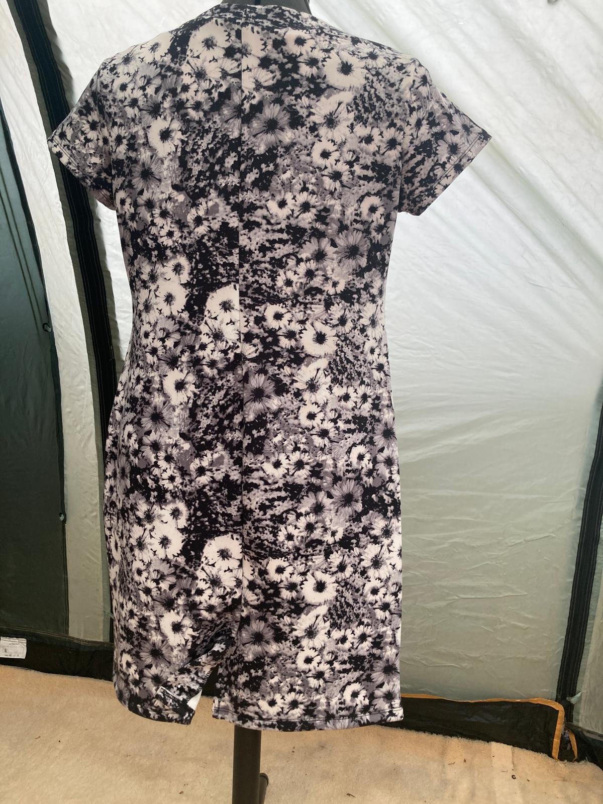 Back view of floral dress with black and white pattern