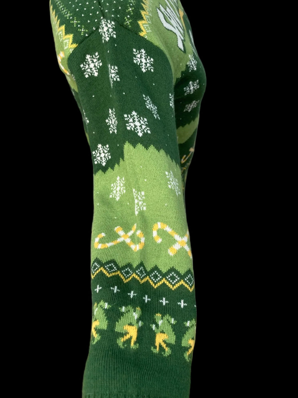 Close-up of festive sweater with snowflake and reindeer patterns